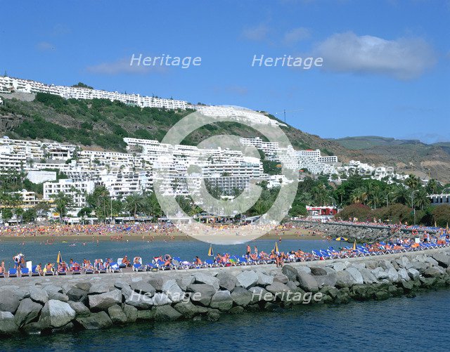 Beach and breakwater, Puerto Rico, Gran Canaria, Canary Islands.