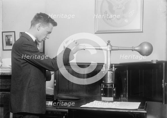 Seal of The United States at State Department, 1917. Creator: Harris & Ewing.