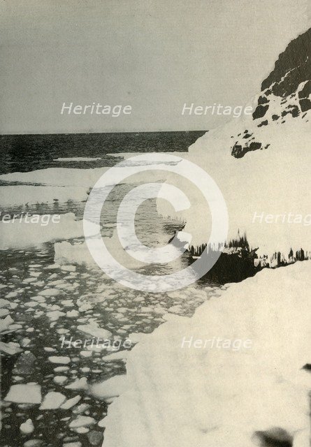 'The First Landing-Place, Showing Bay Ice Breaking Out and Drifting Away North', 1908, (1909). Artist: Unknown.