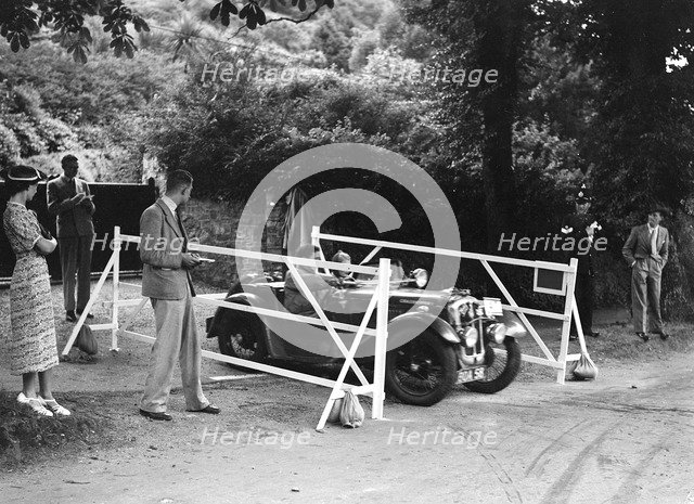 Austin 7 of CD Buckley, winner of a premier award at the MCC Torquay Rally, July 1937. Artist: Bill Brunell.