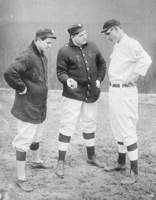 Rube Marquard standing at right, Libe Washburn in center & Mike..., New York, NL (baseball), 1911 Creator: Bain News Service.