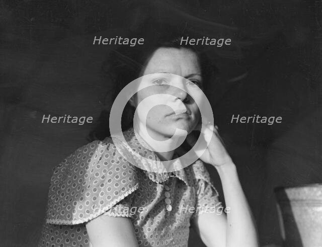 One of migratory family in FSA labor camp, Calipatria, Imperial Valley, California, 1939. Creator: Dorothea Lange.