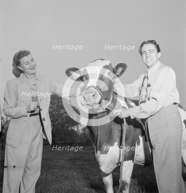 Portrait of Enric Madriguera and Patricia Gilmore on their farm, Connecticut, ca. June 1947. Creator: William Paul Gottlieb.