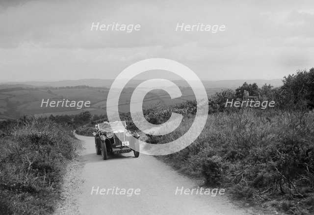 MG Magna of EG Burt competing in the MCC Torquay Rally, 1938. Artist: Bill Brunell.