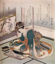 'A woman making a miniature model of Mount Fuji', c1823. Creator: Hokusai.