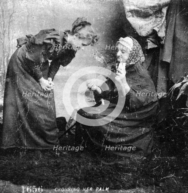 'Crossing Her Palm'. Artist: Unknown