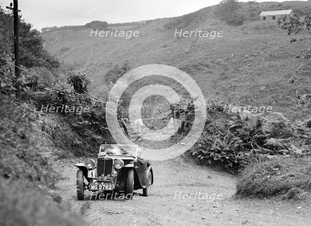 MG Magnette taking part in a motoring trial in Devon, late 1930s. Artist: Bill Brunell.