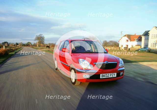 2002 Daihatsu Sirion 1.3 SL. Artist: Unknown.