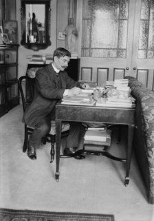 Unidentified man seated at desk, between c1915 and c1920. Creator: Bain News Service.