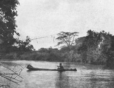 ''Indigene de l'Angola naviguant sur un fleuve; Afrique Australe', 1914. Creator: Unknown.