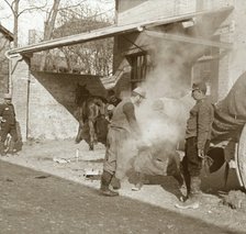 Blacksmith shoeing horse, Suippes, northern France, c1914-c1918. Artist: Unknown.