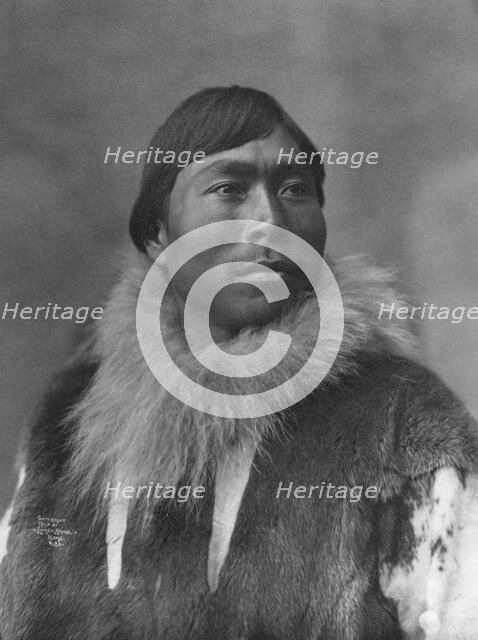 Eskimo posing , c1903, printed (1927?). Creator: Lomen Brothers.