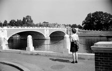 Woman admiring Hampton Court Bridge, London, c1945-c1965. Artist: SW Rawlings