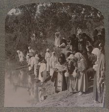 'Russian women holding service on the banks of the Jordan', c1900. Artist: Unknown.