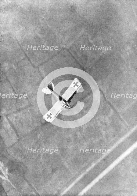 A German Aviatik aircraft photographed in flight by a Belgian aviator, Ypres, Belgium, 1916. Artist: Unknown