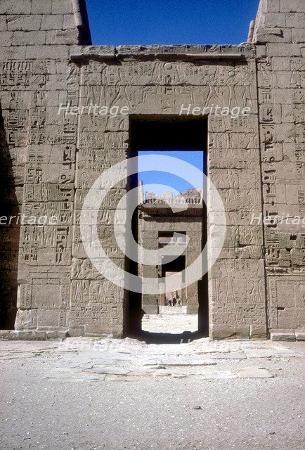 View through the Pylons, Mortuary Temple of Rameses III, Medinat Habu, Luxor, c12th century BC. Artist: Unknown