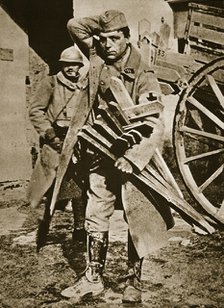 French soldier with wooden crosses to be placed on temporary graves, World War I, c1914-c1918. Artist: Unknown