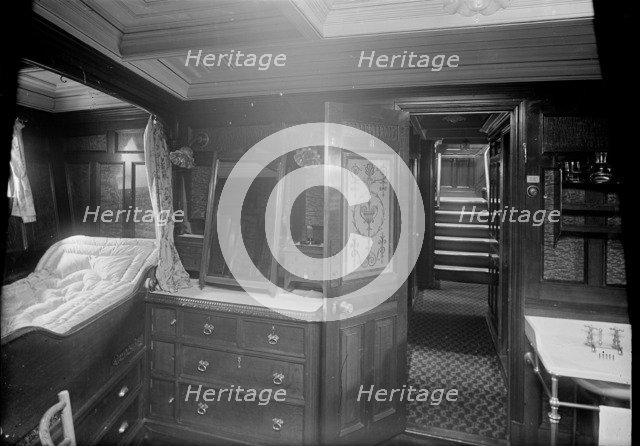 Interior of cabin on steam yacht 'Venetia', 1920. Creator: Kirk & Sons of Cowes.