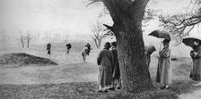 Playing golf on Tooting Bec Common, London, 1926-1927. Artist: Unknown