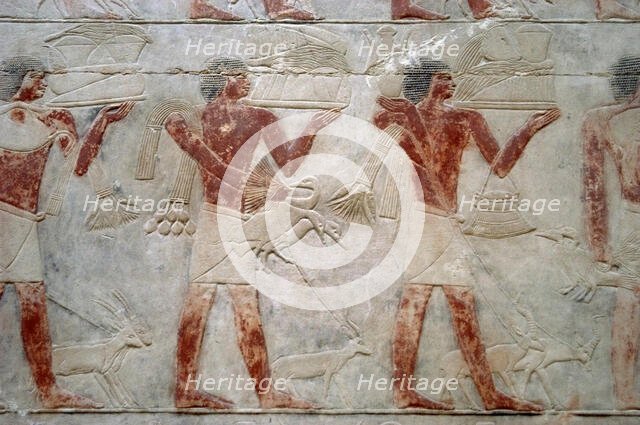 Offering bearers, polychrome relief, Mastaba of Kagemni, Saqqara, Egypt, 2350 BC (2003). Creator: Unknown.