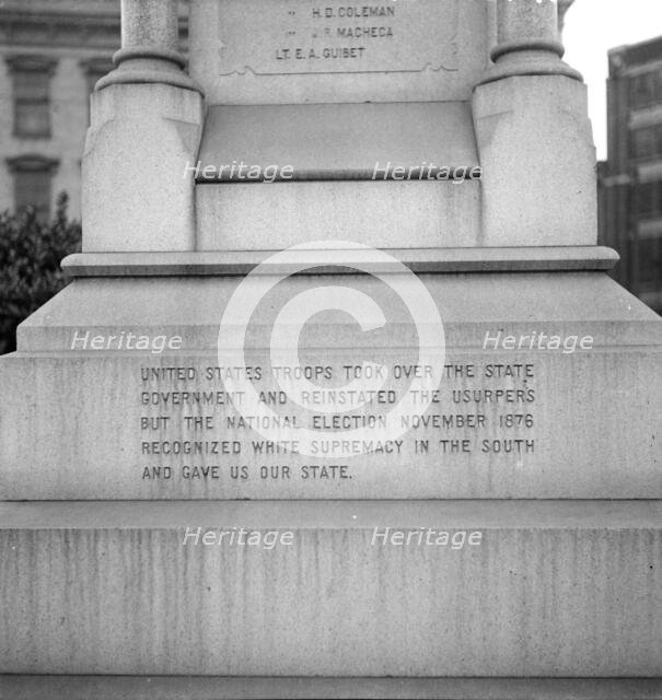One side of the monument erected to race prejudice, New Orleans, Louisiana, 1936. Creator: Dorothea Lange.