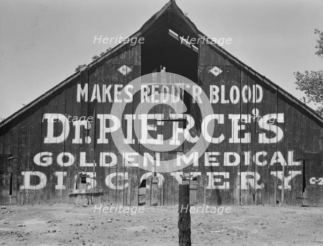 Dairy barn, between Tulare and Fresno, California, 1939. Creator: Dorothea Lange.