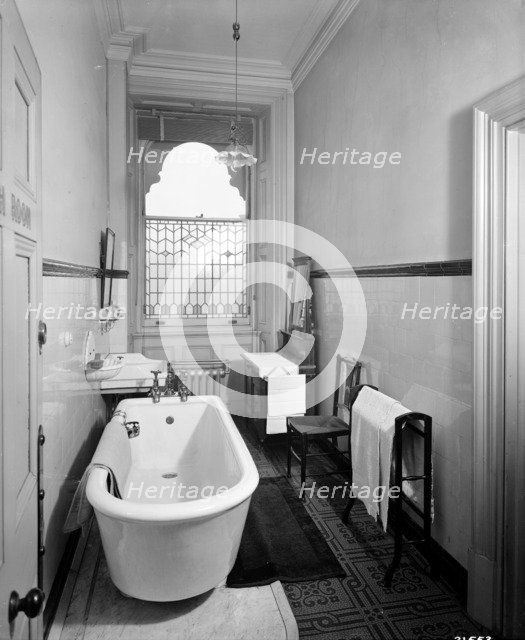 An early bathroom in the Grand Hotel, Northumberland Avenue, London, 1912.  Artist: Bedford Lemere and Company
