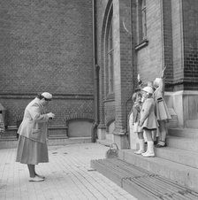 First day at school: a mother photographing her daughter and friends, Landskrona, Sweden, 1952. Artist: Unknown
