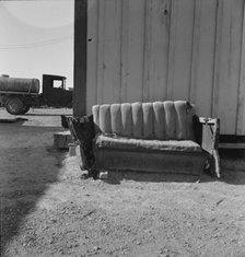 The postmaster's seat, Finlay, Texas, 1937. Creator: Dorothea Lange.