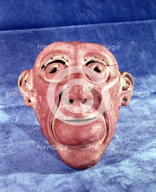 Brest mask made of clay of 14 cm in height, comes from the archaeological site of Tlatilco, in th…