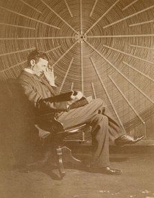 Nikola Tesla and his spiral oscillating transformer, 1896. Creator: Anonymous.