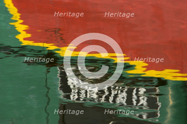 Reflections of a bantam tug at Battlebridge Basin, Regent's Canal, Camden, London, c2009.  Artist: Derek Kendall.