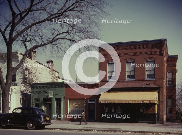 Laundry, barbershop and store, Washington, D.C.?, between 1941 and 1942. Creator: Louise Rosskam.