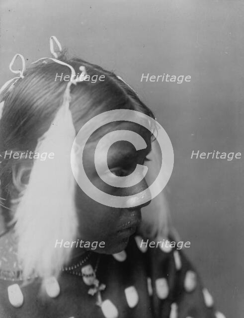 Red Cloud's granddaughter, c1907. Creator: Edward Sheriff Curtis.