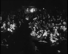 Civilians Drinking in a Bar in Celebration, 1930s. Creator: British Pathe Ltd.