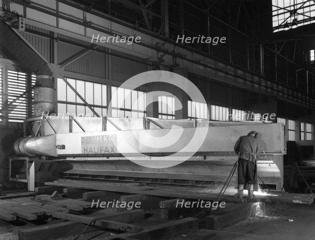 Steelworker at Park Gate Iron and Steel Co, Rotherham, South Yorkshire, April 1964.  Artist: Michael Walters