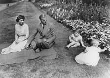The Royal family in the gardens of Clarence House, London, 1951.  Creator: Unknown.