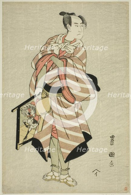 The actor Sawamura Sojuro III as the packhorse-man Muchizo in the play "Miyamairi Musub..., c. 1797. Creator: Utagawa Toyokuni I.