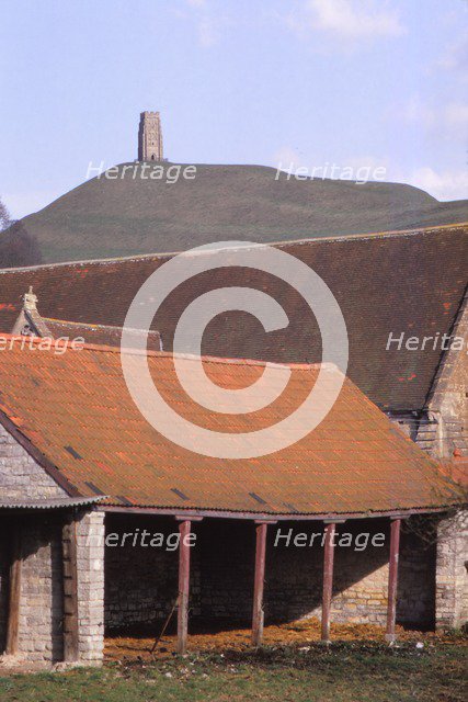 Glastonbury Tor and Ancient Tithe Barn, Somerset, 20th century. Artist: CM Dixon.