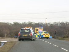 Police car and ambulance attending road traffic accident 2018. Creator: Unknown.