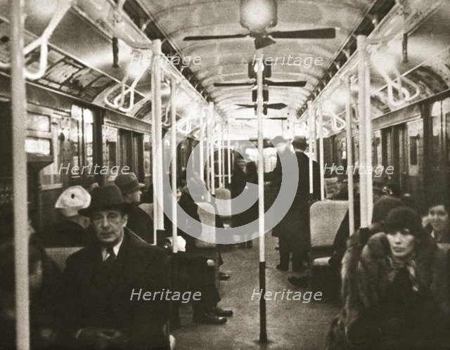 Interior of an Eighth Avenue subway carriage, New York, USA, early 1930s. Artist: Unknown