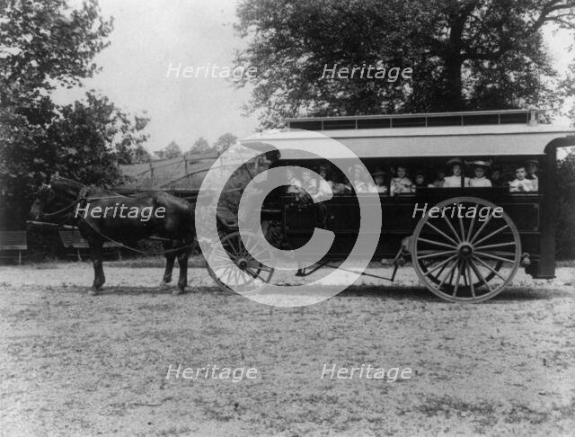 School children of the 6th Division in a horse-drawn car, (1899?). Creator: Frances Benjamin Johnston.