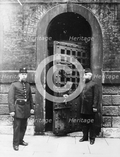 Chief Warder and his assistant at the inner door of Newgate Prison, London. Artist: Unknown