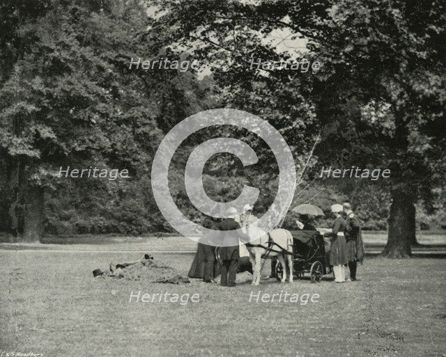 'Her Majesty Planting a Tree in the Grounds of Buckingham Palace as a Memorial of the Jubilee, June Artist: E&S Woodbury.