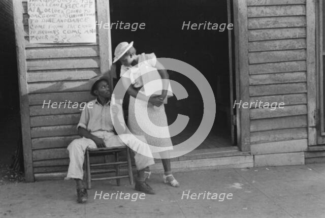 Sidewalk scene, Alabama, 1936. Creator: Walker Evans.