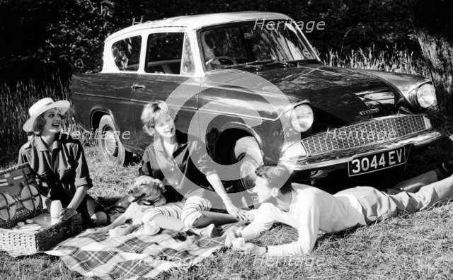People picnicking with their 1960 Ford Anglia Deluxe, (1960?). Artist: Unknown