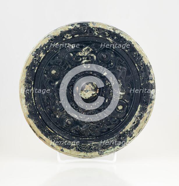 Mirror with dragon and tiger design, 0-199. Creator: Unknown.