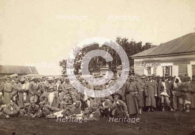 Group of convicts ready to embark on a prison barge, Tiumin [ie, Tiumen], between 1885 and 1886. Creator: Unknown.