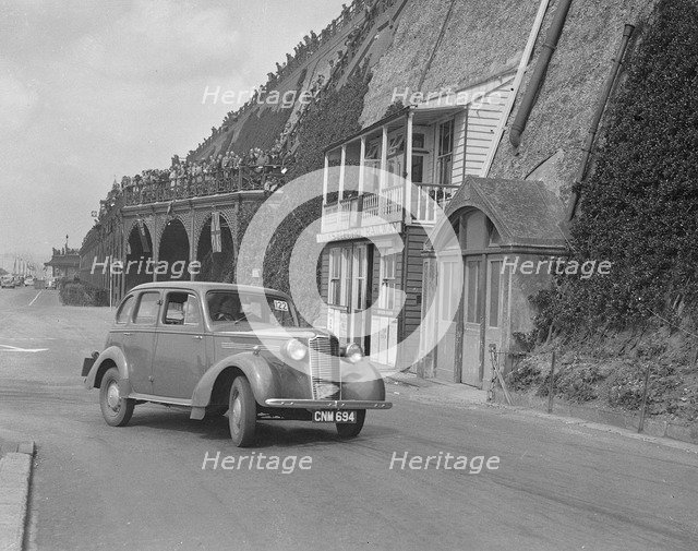 Vauxhall 14-6 of GL Boughton competing in the RAC Rally, Madeira Drive, Brighton, 1939. Artist: Bill Brunell.