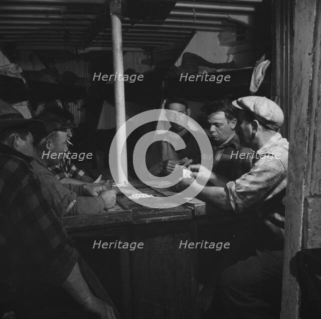 On board the fishing boat Alden, out of Gloucester, Massachusetts, 1943. Creator: Gordon Parks.